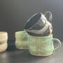 Abstract Splash Medium 300ml Coffee Mug In Cream, Black Or Turquoise, thumbnail 1 of 12