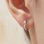 Sterling Silver Dainty Braided Huggie Hoop Earrings, thumbnail 1 of 10