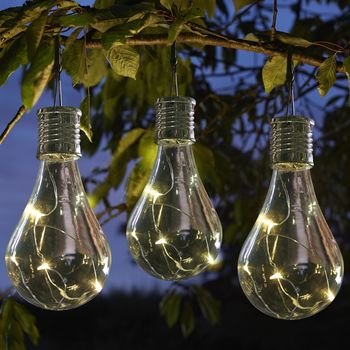 set of six solar lightbulb hanging garden lights by london garden ...