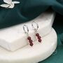 Sterling Silver Genuine Garnet Stone Trio Huggie Hoop Earrings, thumbnail 1 of 10