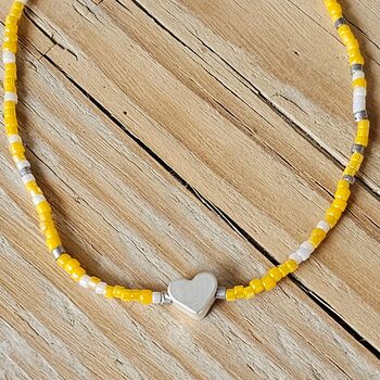 Seed Bead Bracelet In Yellow With Heart Charm, 2 of 3