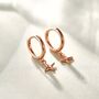 Sterling Silver Tiny Four Point Star Huggie Hoop Earrings, thumbnail 3 of 11
