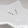 Tiny Sterling Silver Star Earrings, thumbnail 1 of 4