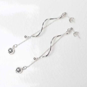 Sterling Silver Dancing Twist And Ball Stud Earrings, 4 of 5