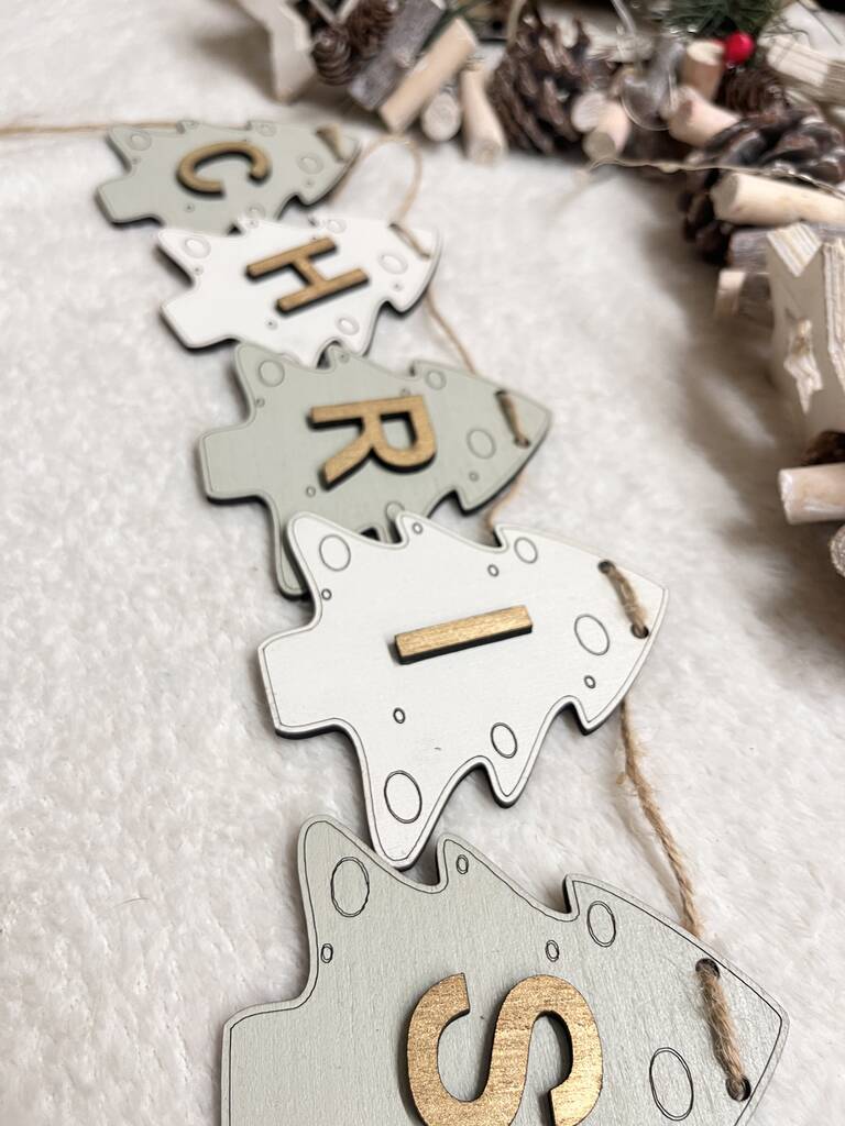 Personalised Wooden Christmas Bunting Charming Seasonal Garland For Home Decor, 1 of 12