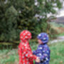 Weather Colour Changing Raincoat, thumbnail 1 of 6