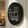 Living Room Door Sign In Matte Black Acrylic With Raised Sofa Design, thumbnail 1 of 6