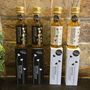 Two Black And Two White Truffle Oil Packs, thumbnail 2 of 9