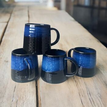 Set Of Four Reactive Glaze Brûlée Mugs In Black And Blue, 7 of 7