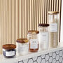 Slim Storage Jar With Acacia Wood Lid And Personalised Label, thumbnail 2 of 9