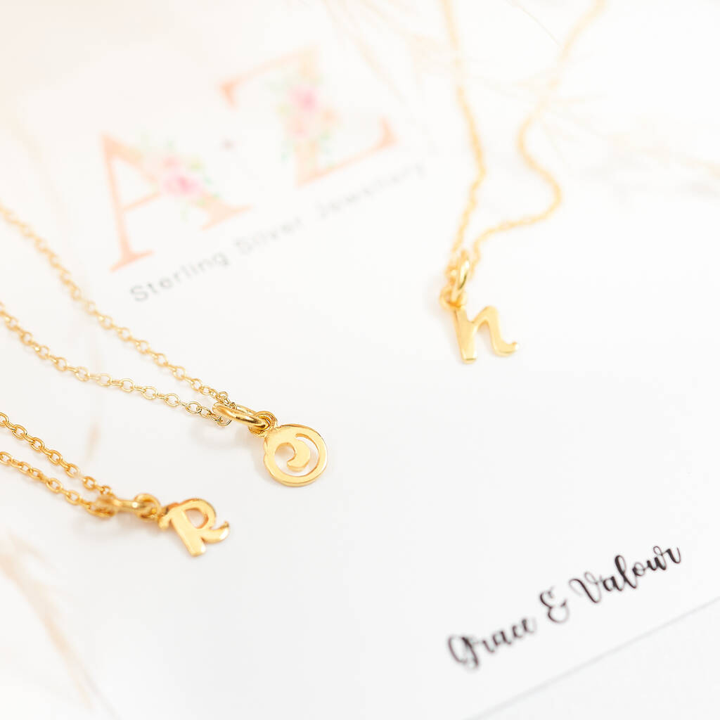 Gold And Silver Initial Necklace In Script Font, 1 of 11