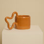 Orange Handmade Ceramic Mug With Wiggle Handle, thumbnail 4 of 6