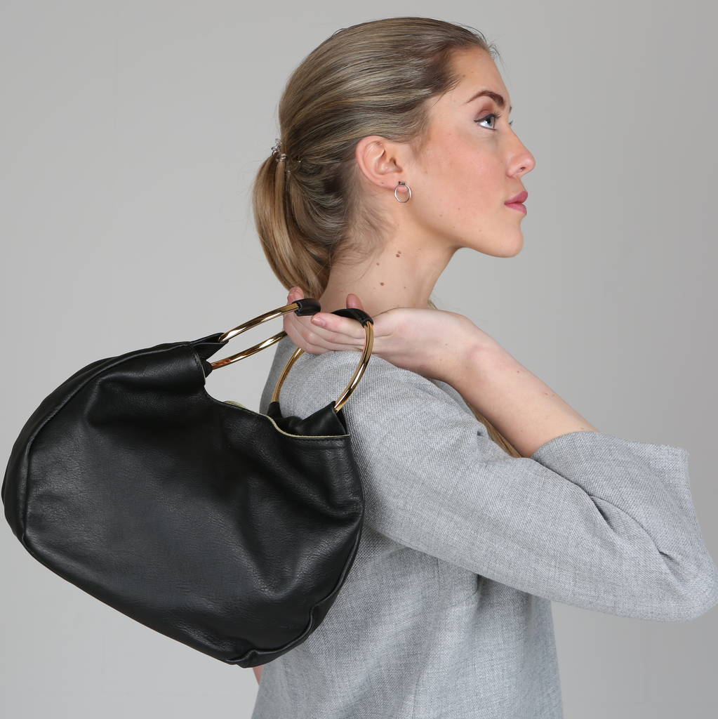 leather bag with metal handle by attic | notonthehighstreet.com