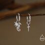 Mismatched Tiny Dragon And Sword Huggie Hoops In Sterling Silver, thumbnail 1 of 12