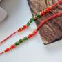 Red Beads Slim Thread Rakhi For Raksha Bandhan, thumbnail 3 of 8