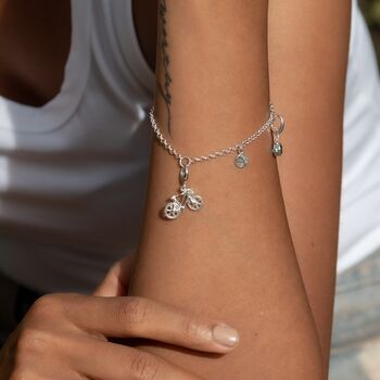 Sterling Silver Three Station Charm Collector Bracelet With Hammered Discs, 2 of 4