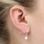 Sterling Silver Round Pearl Huggie Hoop Earrings, thumbnail 2 of 7