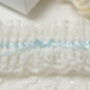 Satin And Lace Bridal Wedding Garter With Blue Ribbon, thumbnail 2 of 2