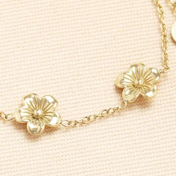 Stainless Steel Blossom Flower Charm Bracelet In Gold, 2 of 2