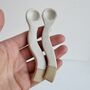 Handmade Oatmeal Wavy Pottery Serving Spoon, thumbnail 1 of 7