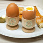 Personalised Foliage Wreath Wooden Egg Cups, thumbnail 1 of 2