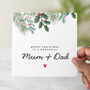 Festive Mum And Dad Christmas Card, thumbnail 1 of 3