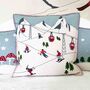 Alpine Themed Little Skiers Embroidered Wool Cushion, thumbnail 1 of 3