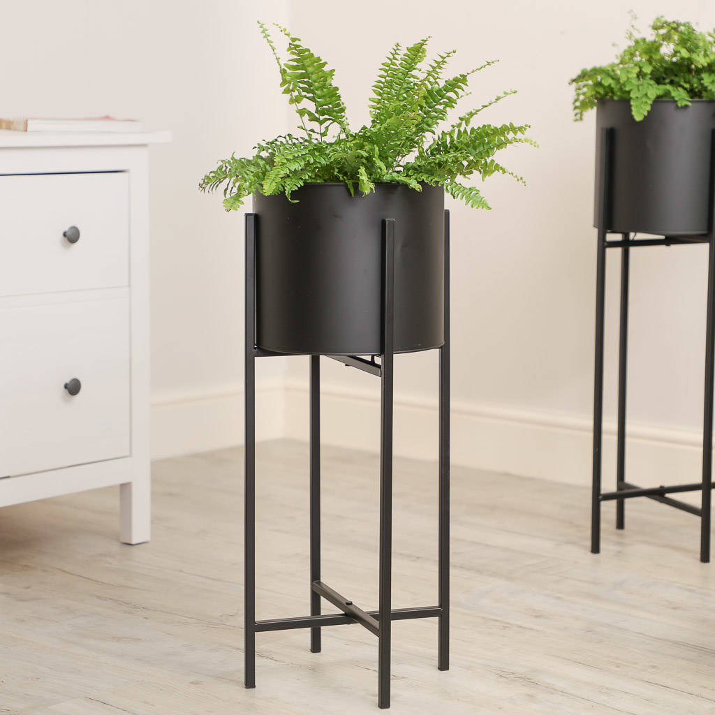 contemporary black metal drum planters with stand by dibor