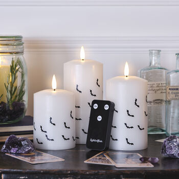 Set Of Three Tru Glow LED Pillar Candles With Bat Decal, 2 of 4