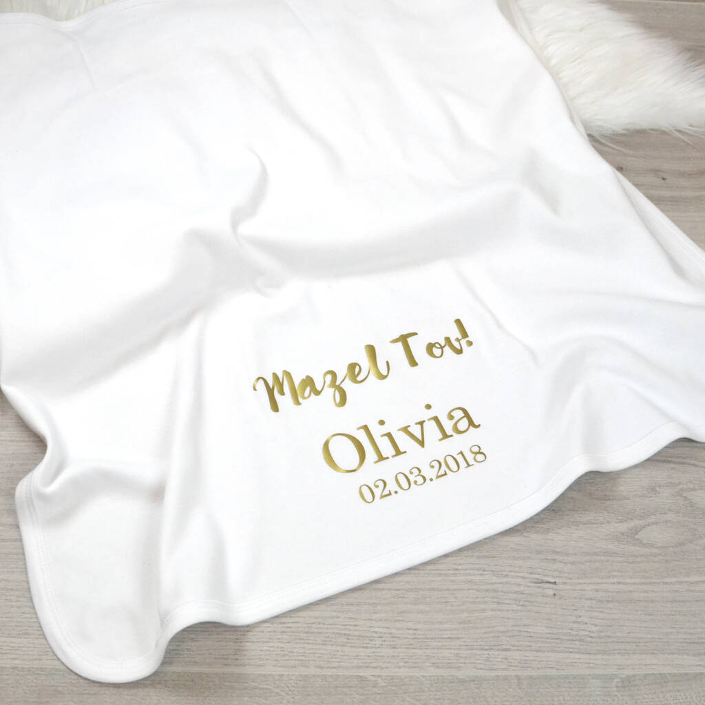 white cotton baby blanket