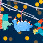 Set Of Four Children's Dinosaur Christmas Decorations, thumbnail 3 of 4