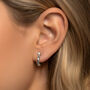 Women's Small Huggie Hoop Stud Earrings With Sparkling Stone In 18k White Gold, thumbnail 1 of 4