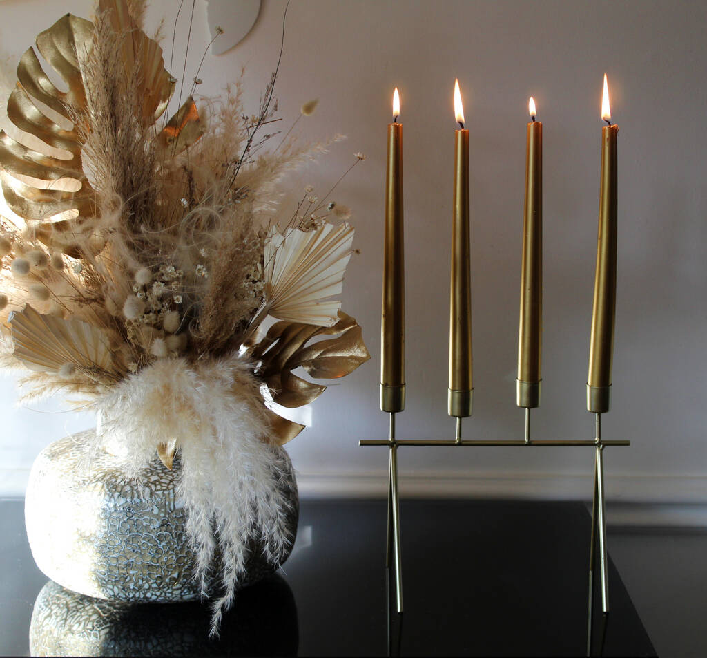 Golden Candelabra With Gold Taper Candles By Objet Dahlia