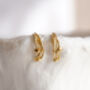 Gold Sculptural Huggie Earrings, thumbnail 3 of 5