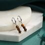 Sterling Silver Genuine Tiger's Eye Stone Trio Huggie Hoop Earrings, thumbnail 1 of 10