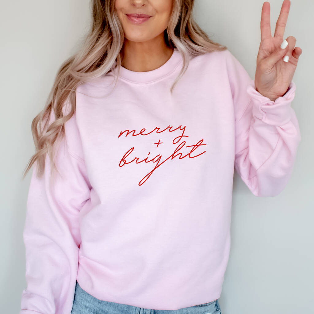 Ladies Merry And Bright Pink Christmas Jumper By Betty Bramble