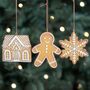 Set Of Three Hanging Gingerbread Decorations, thumbnail 1 of 3