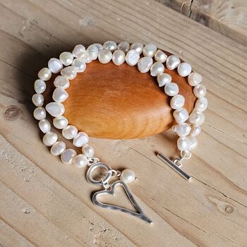 Twin Strand Cream Pearl Bracelet With Open Heart Charm, 2 of 3