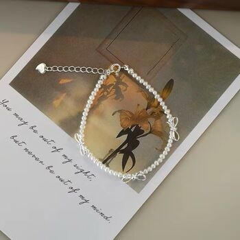 Saskia Ivory Silver Pearl Ribbon Ball Charm Gift Bracelet, 6 of 6