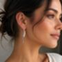 Sterling Silver Hammered Long Wave Drop Earrings, thumbnail 3 of 10