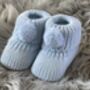 Blue Knitted Baby Booties With Pom Pom, thumbnail 3 of 7