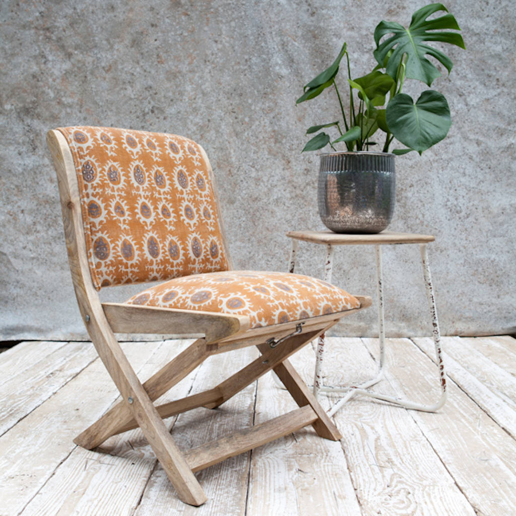 upholstered folding mango wood chair by the forest & co