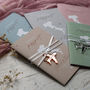 Dusty Blue Passport Invitation With Acrylic Plane Charms For Destination Wedding, thumbnail 5 of 9