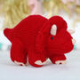 Red Triceratops Dinosaur Rattle With Personalised Bag, thumbnail 2 of 2