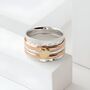 Sterling Silver Hammered Spinner Ring With Golden Heart, thumbnail 1 of 4