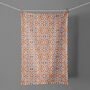 Orange Flower Tea Towel | 100% Cotton | Made In The UK, thumbnail 3 of 12