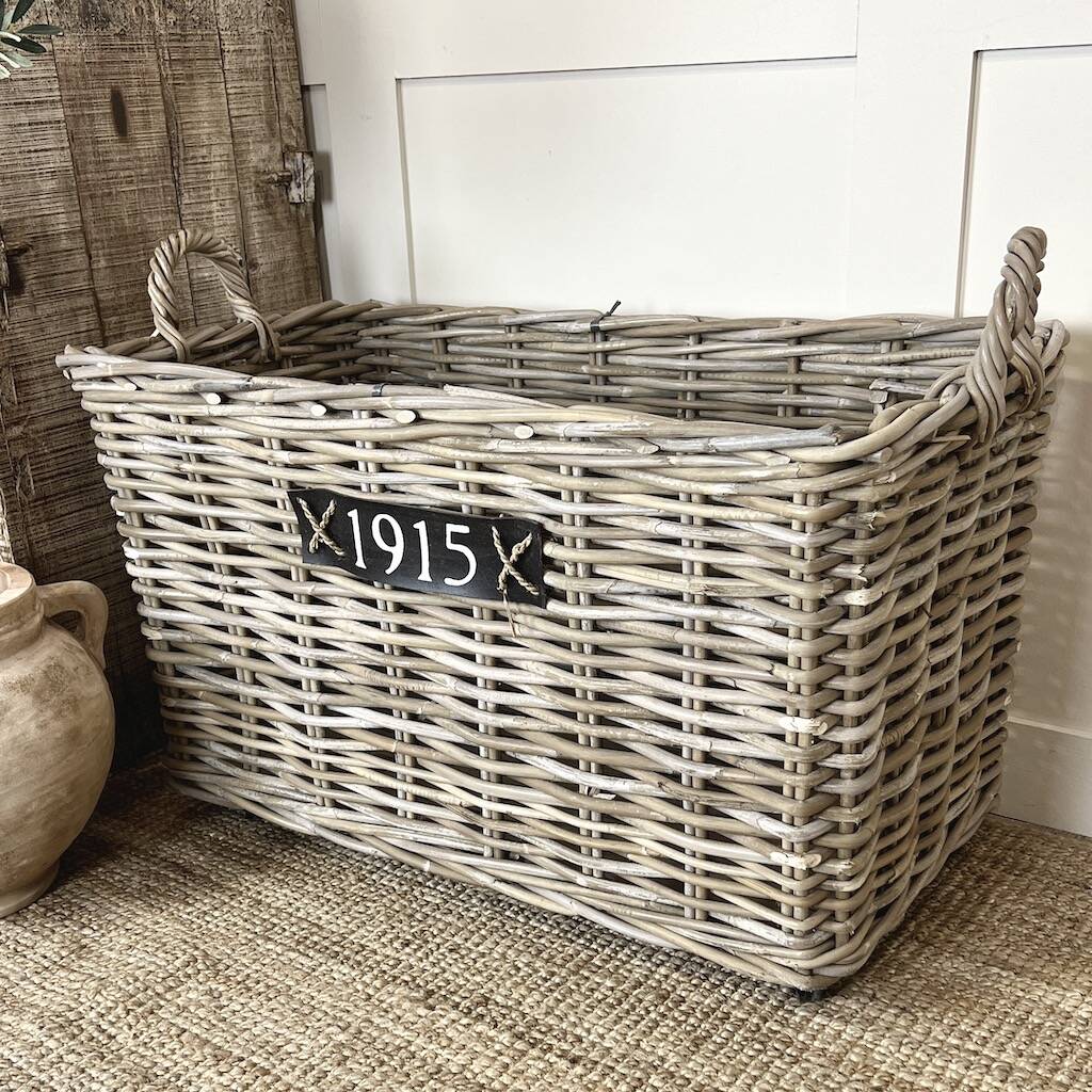 1915 Large Wicker Baskets On Wheels By Cowshed Interiors