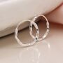 Sterling Silver Twisted Huggie Hoop Earrings, thumbnail 1 of 10