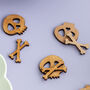 Wooden Skull And Crossbone Halloween Table Confetti, thumbnail 3 of 3