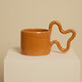 Orange Handmade Ceramic Mug With Wiggle Handle, thumbnail 1 of 6